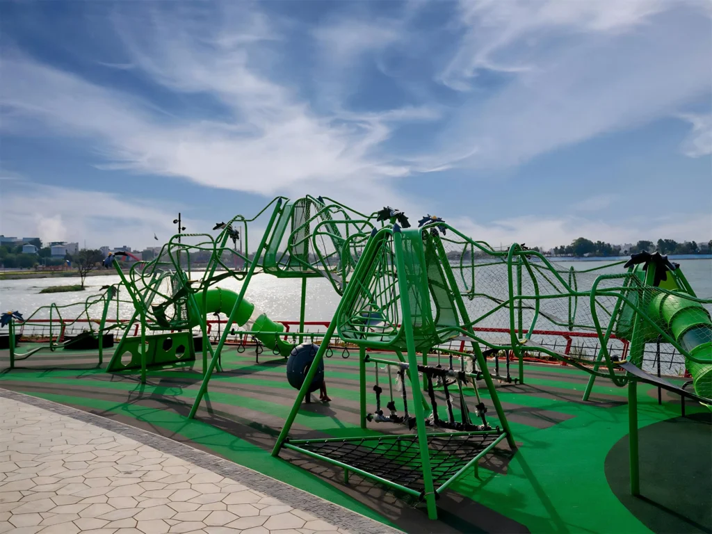 Outdoor playground and recreation area at Komati Cheruvu Siddipet with modern kids play equipment