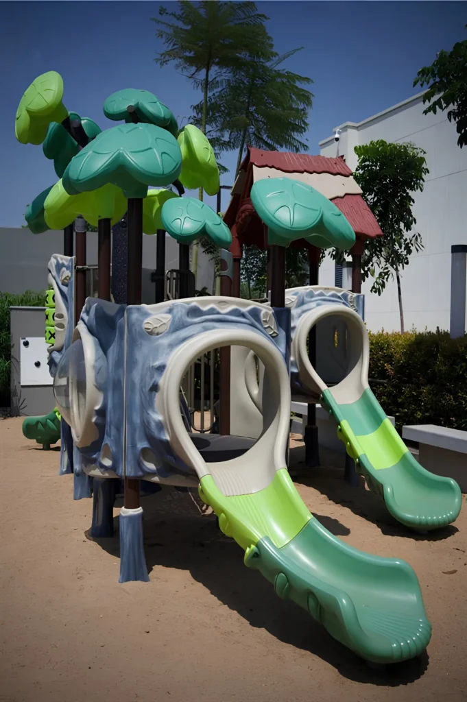 Outdoor playground and kids play area at Aparna Meadows Hyderabad with modern equipment