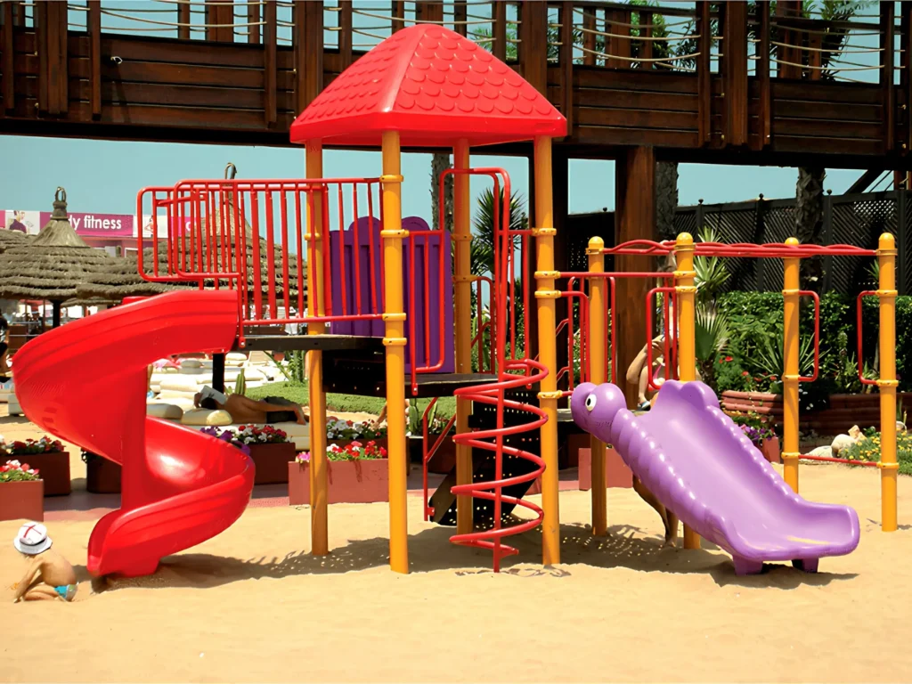 Outdoor playground and recreation area at Tahiti Beach Club Morocco with kids play equipment