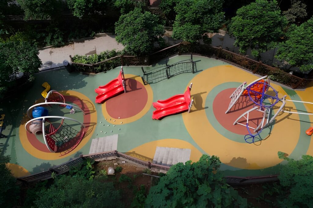 Outdoor playground and kids play area at Castle Rock Mumbai with modern equipment